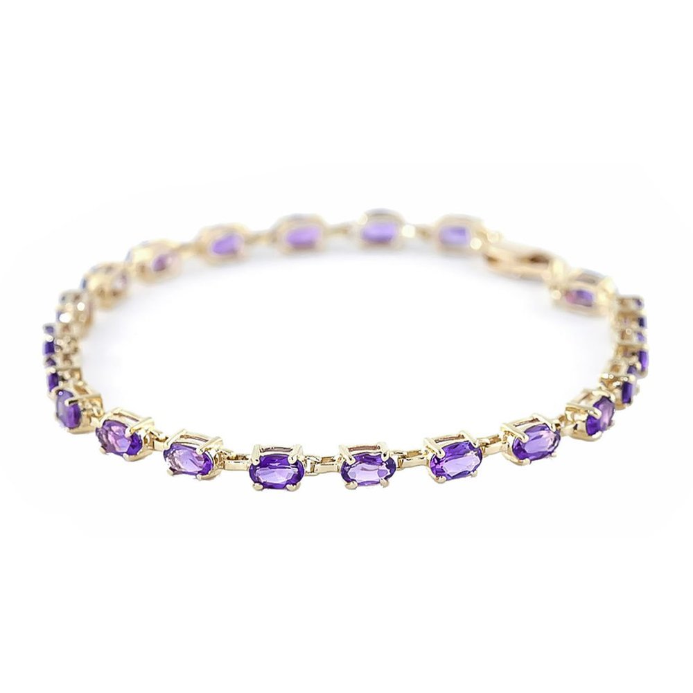 14K. SOLID GOLD TENNIS BRACELET WITH AMETHYST